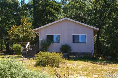 1639 Furlong Road Sebastopol, CA 95472 - Photo 6 of 6 a front view of house with yard and trees