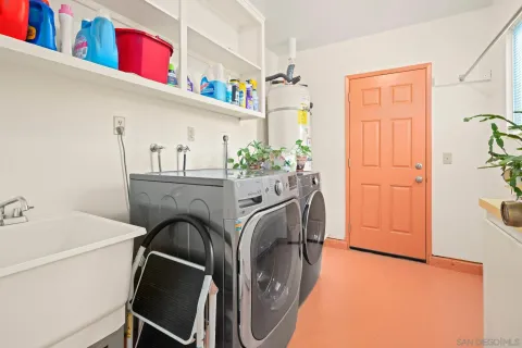 a utility room with dryer and washer