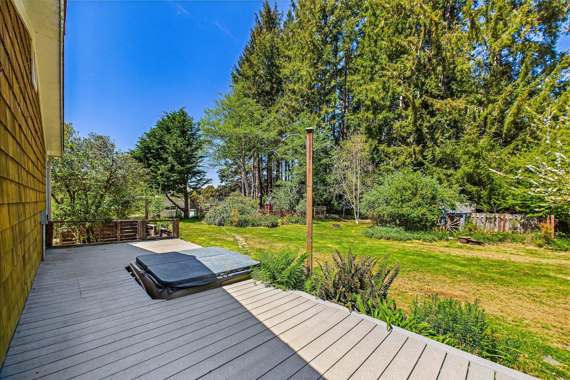 1945 Grange Road McKinleyville, CA 95519 - Photo 42 of 62 a view of a wooden deck with a yard