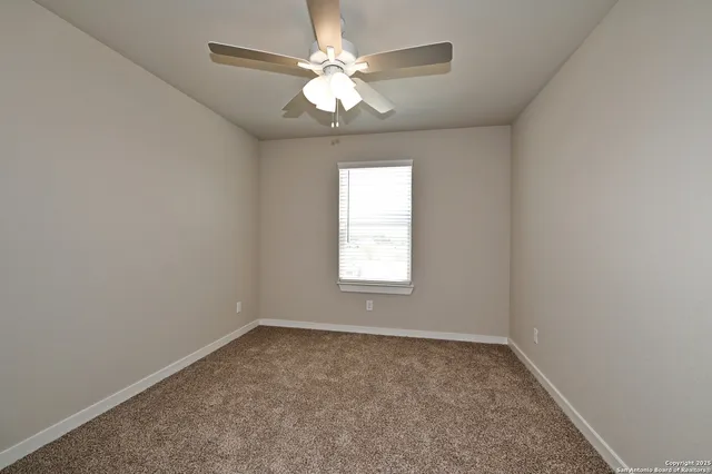 a view of front door and bedroom