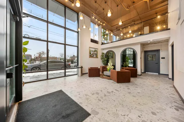 a view of an entryway with a livingroom