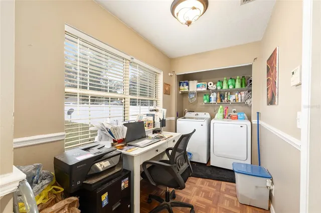 a view of a dining room with furniture window and outside view