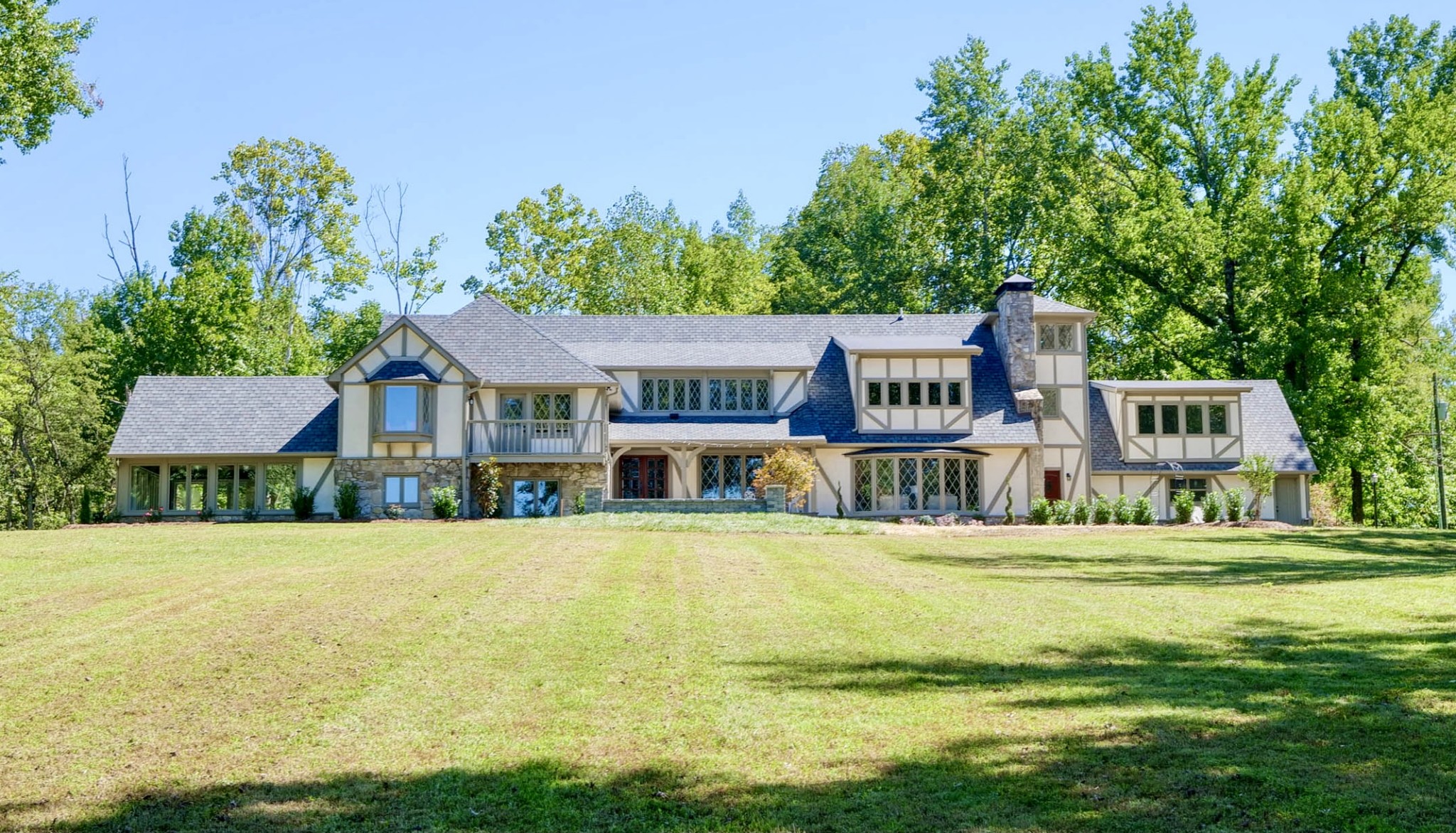a house with garden in front of it