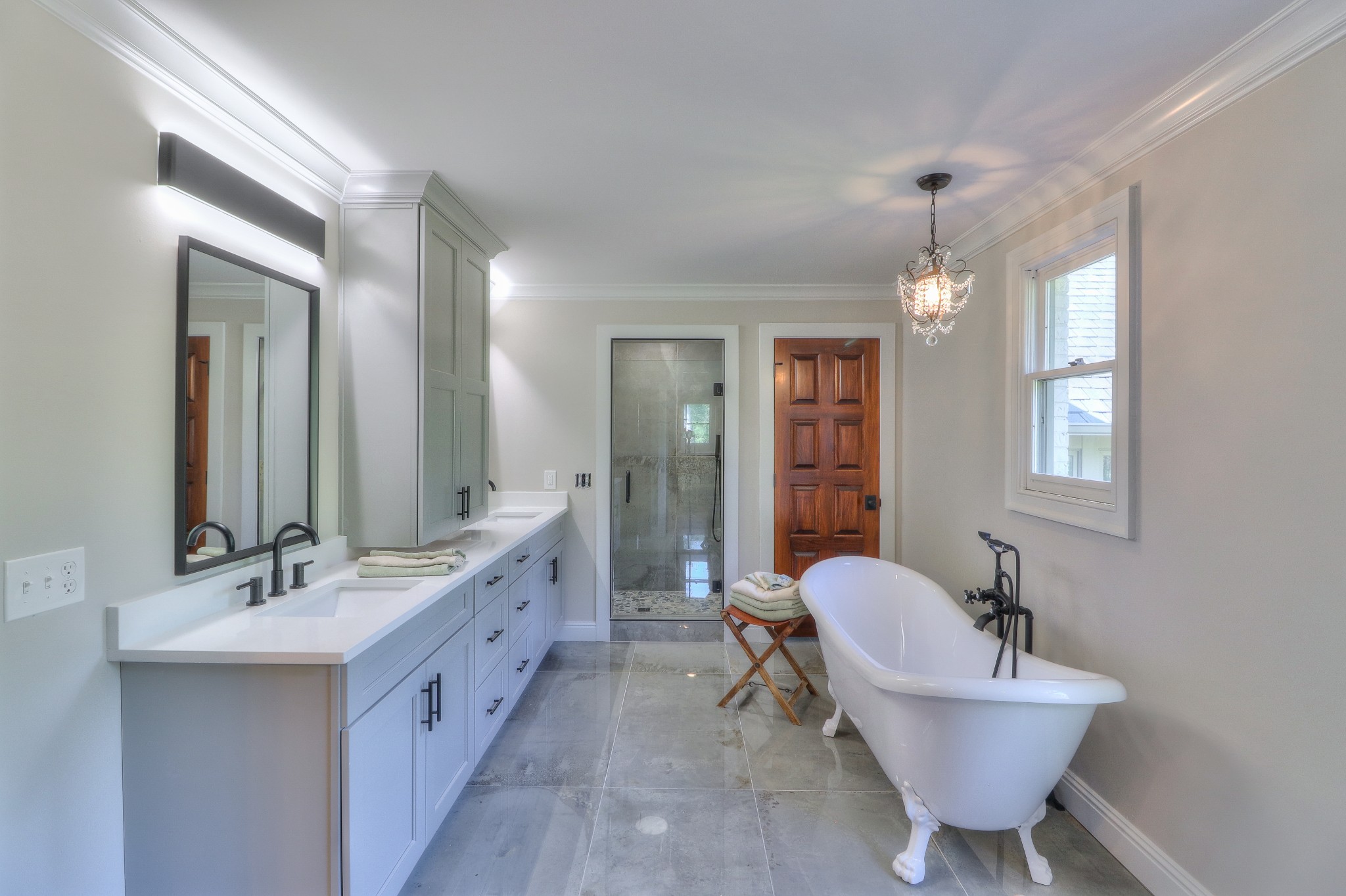 653 Flippen Road Lebanon, TN 37087 - Photo 20 of 49 a bathroom with a double vanity sink mirror and bathtub