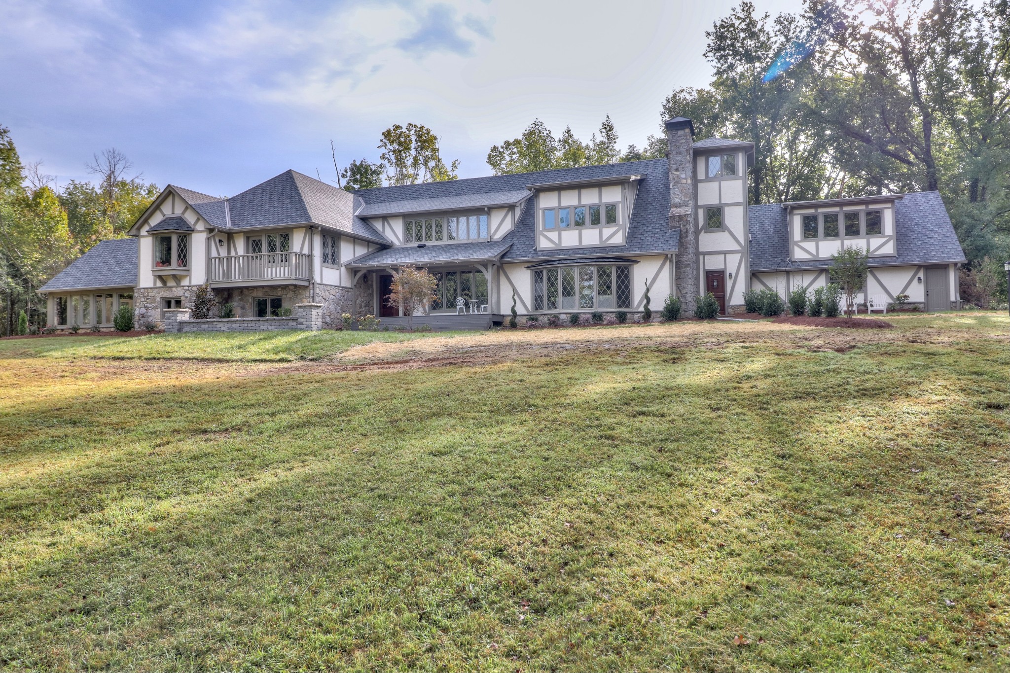 653 Flippen Road Lebanon, TN 37087 - Photo 2 of 49 a view of a big yard next to a building
