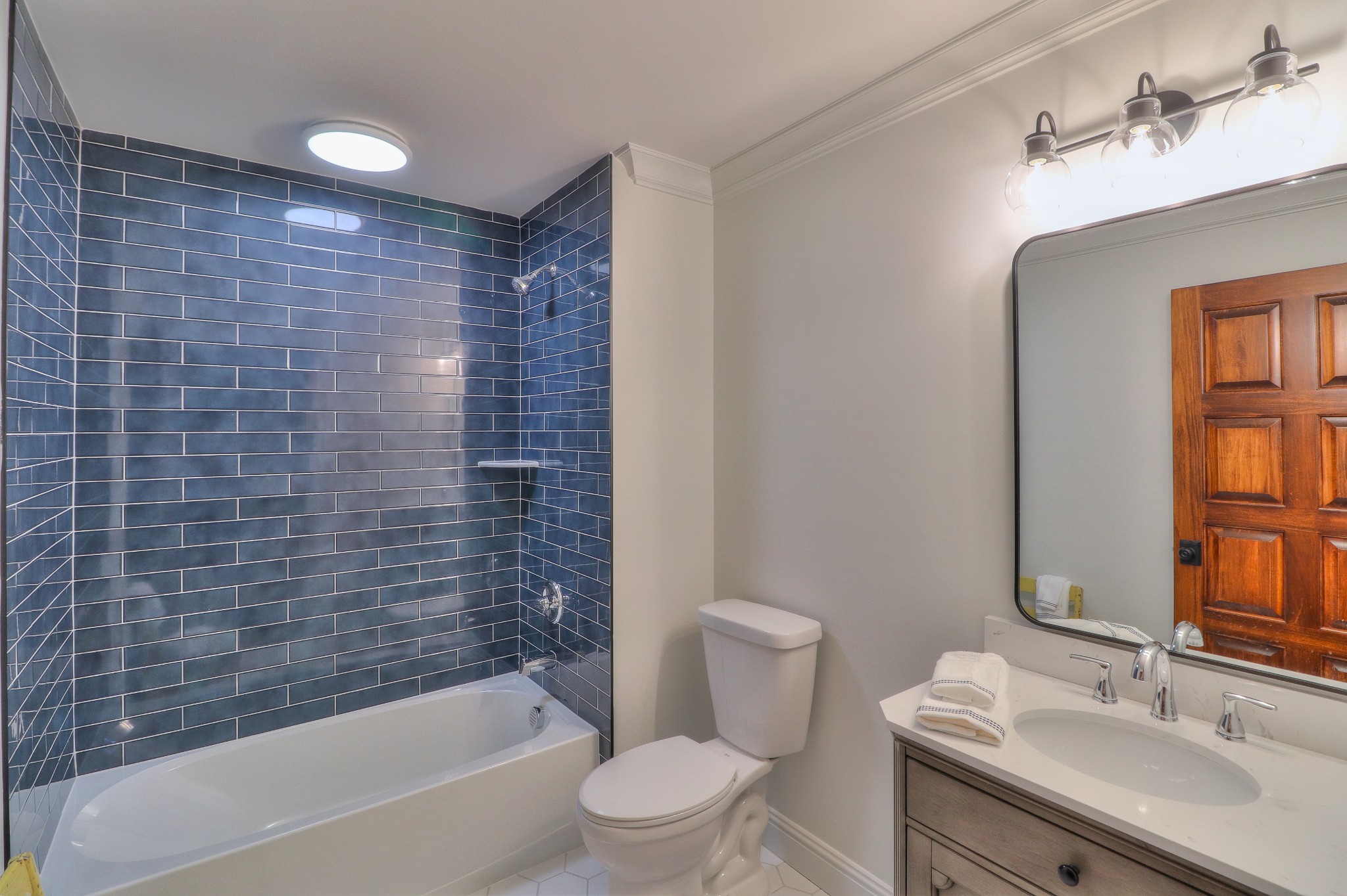 653 Flippen Road Lebanon, TN 37087 - Photo 30 of 49 a bathroom with a sink a toilet and shower