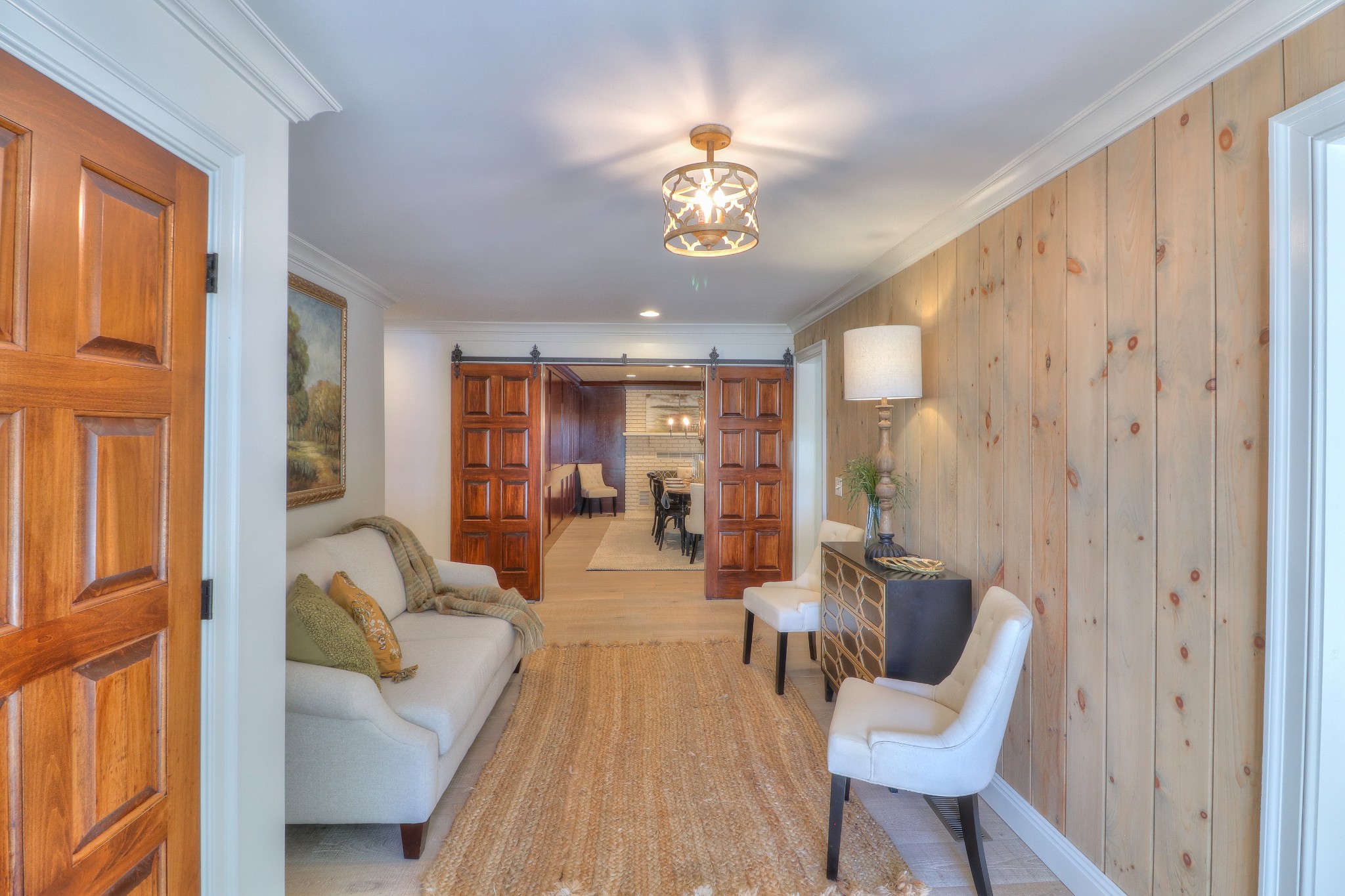 653 Flippen Road Lebanon, TN 37087 - Photo 4 of 49 a view of a livingroom with furniture wooden floor and a chandelier