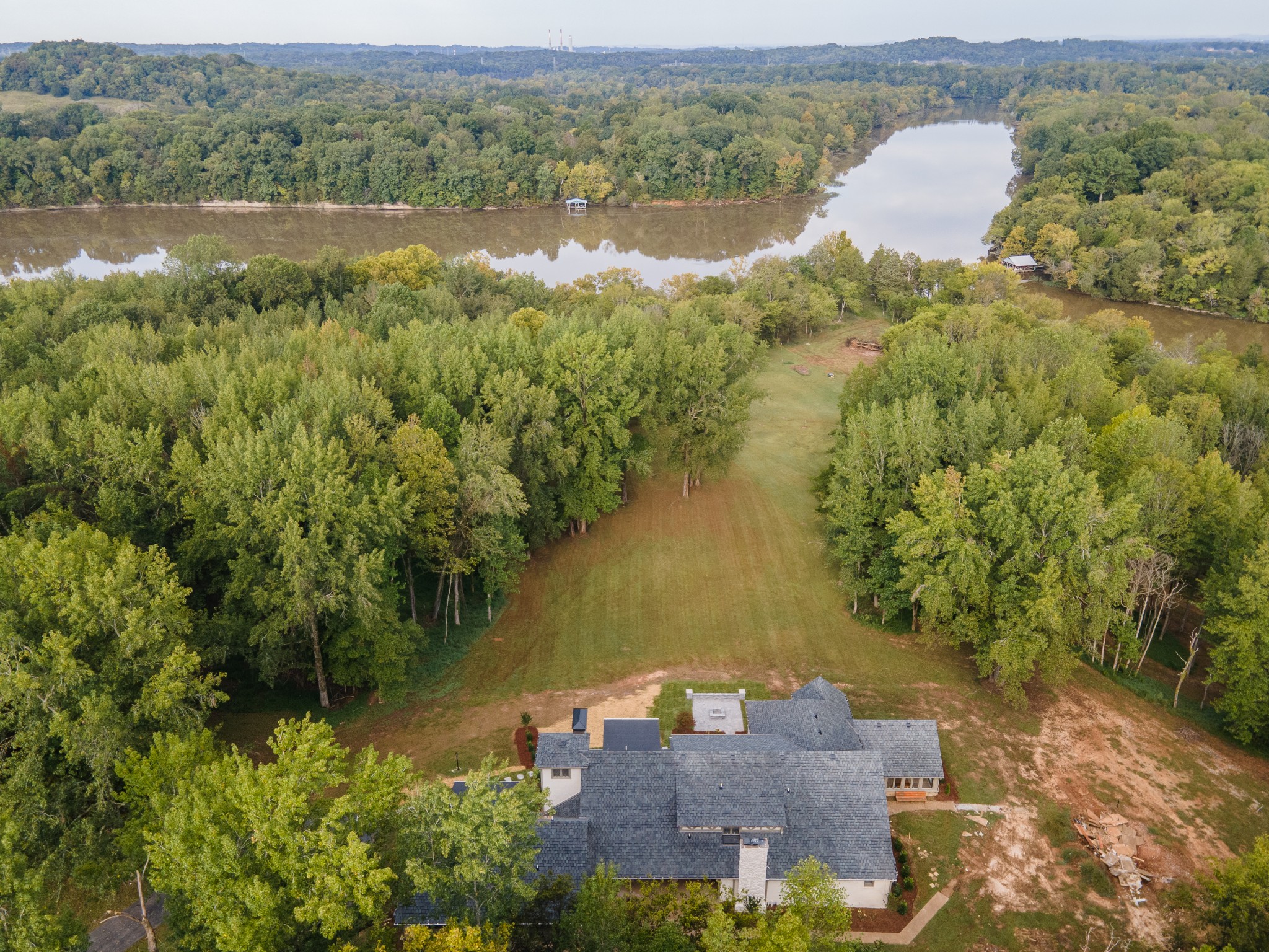 653 Flippen Road Lebanon, TN 37087 - Photo 48 of 49 an aerial view of a house with a lake view