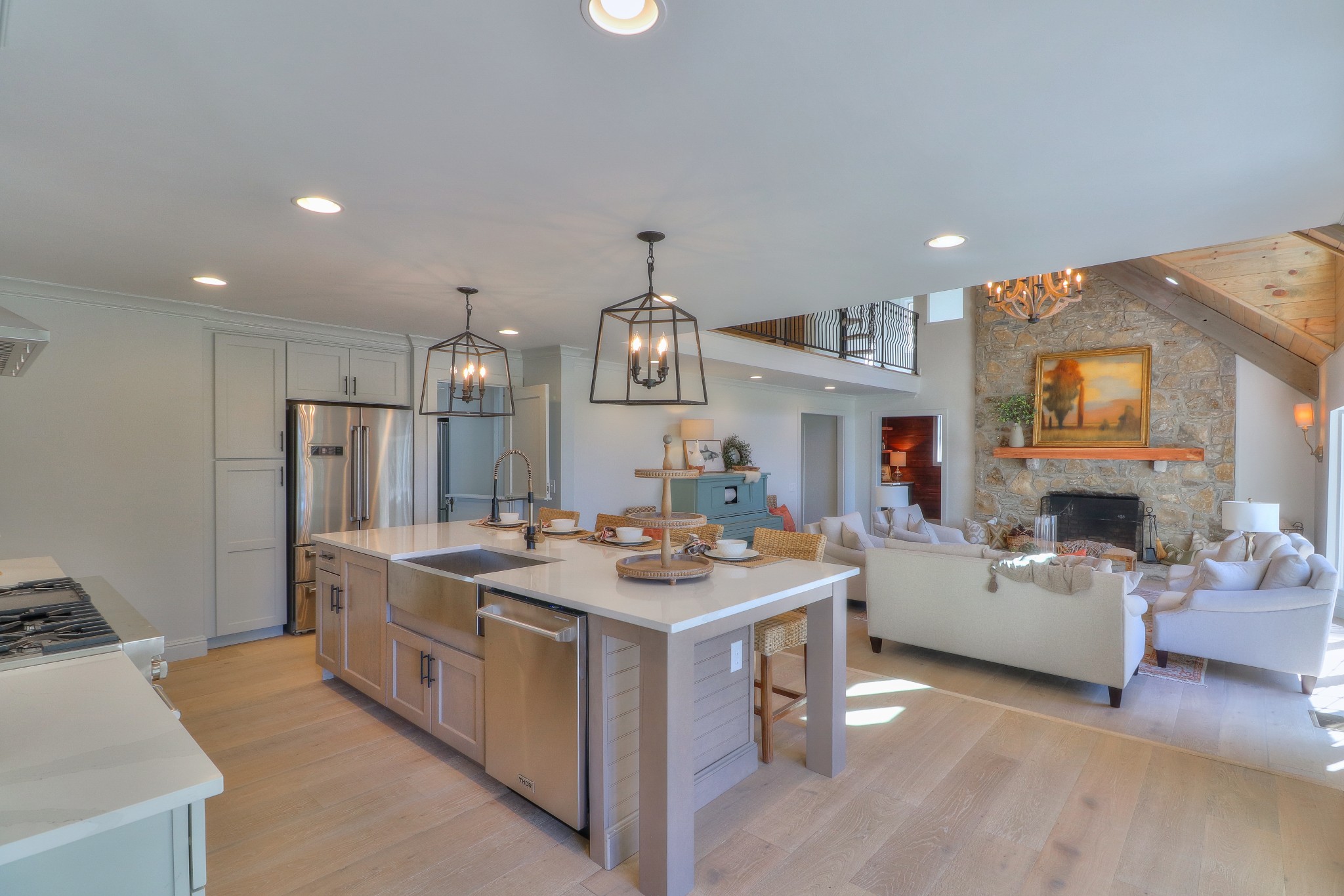 653 Flippen Road Lebanon, TN 37087 - Photo 5 of 49 a view of living room kitchen with stainless steel appliances granite countertop furniture and fireplace