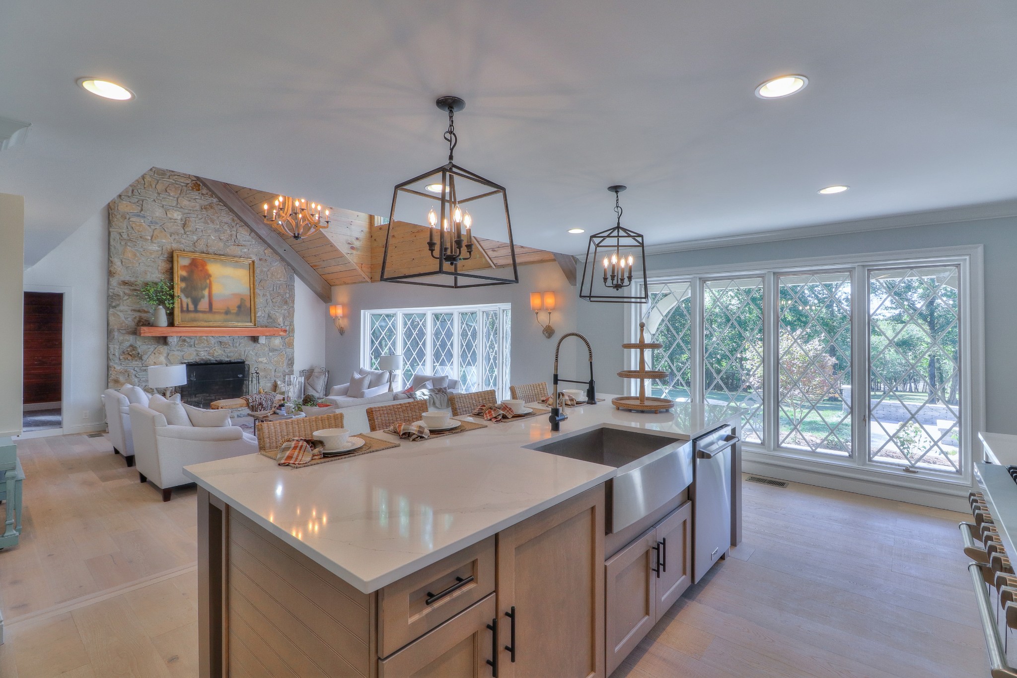 653 Flippen Road Lebanon, TN 37087 - Photo 10 of 49 a open kitchen with sink a stove and a chandelier