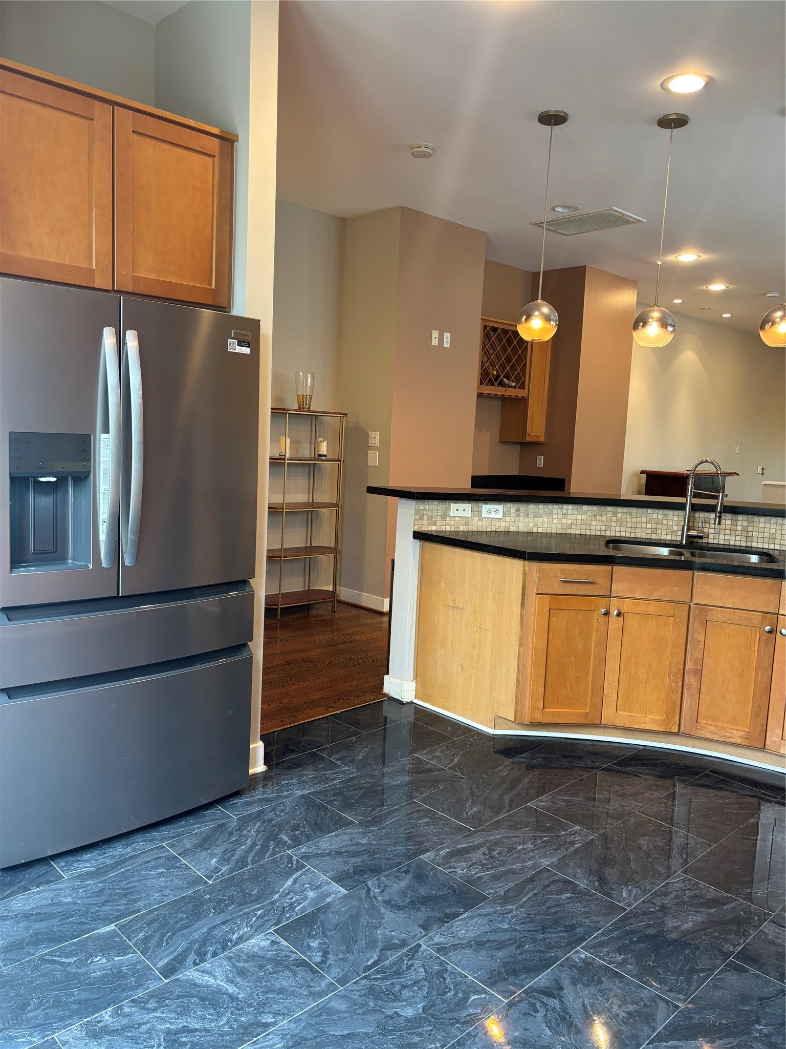 6016 Truro Street Houston, TX 77007 - Photo 11 of 26 Kitchen features a recently upgraded stainless steel French-door refrigerator and dishwasher