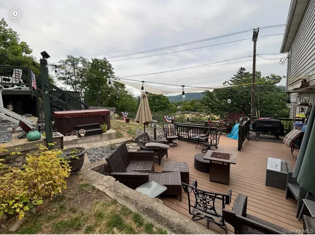 a view of a terrace with furniture