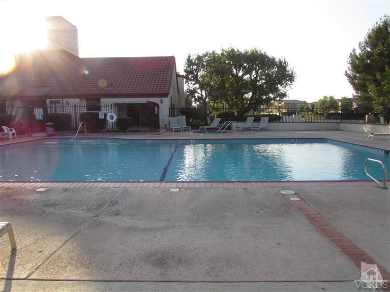 1742 Sinaloa Road, Unit 344 Simi Valley, CA 93065 - Photo 19 of 20 a view of a swimming pool with chairs