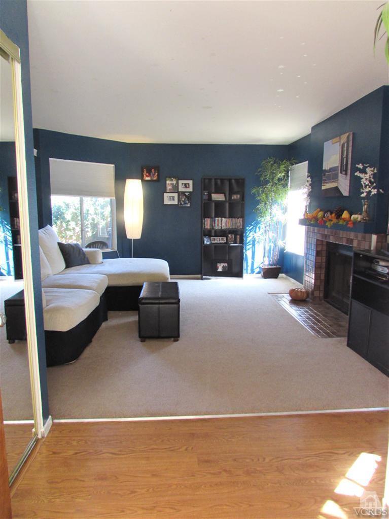 1742 Sinaloa Road, Unit 344 Simi Valley, CA 93065 - Photo 3 of 20 a living room with furniture and a large window