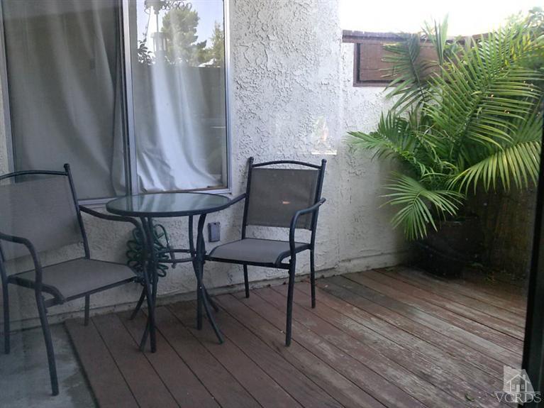 1742 Sinaloa Road, Unit 344 Simi Valley, CA 93065 - Photo 5 of 20 a view of a chairs and table on the wooden floor