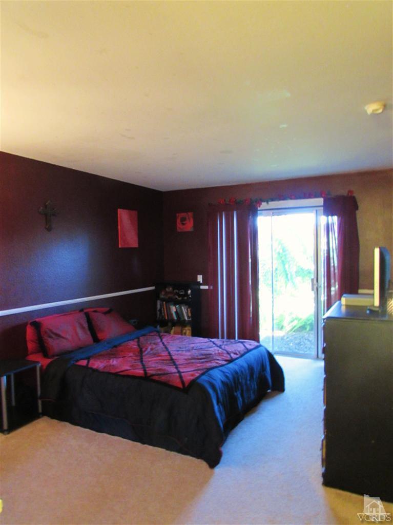1742 Sinaloa Road, Unit 344 Simi Valley, CA 93065 - Photo 7 of 20 a bedroom with a bed and window