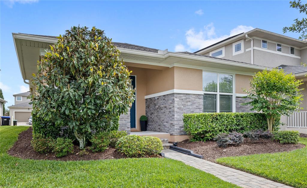 16716 Wingspread Loop Winter Garden, FL 34787 - Photo 38 of 56 front view of a house with a yard