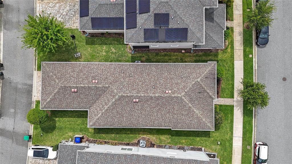 16716 Wingspread Loop Winter Garden, FL 34787 - Photo 42 of 56 an aerial view of a house with a garden and a yard