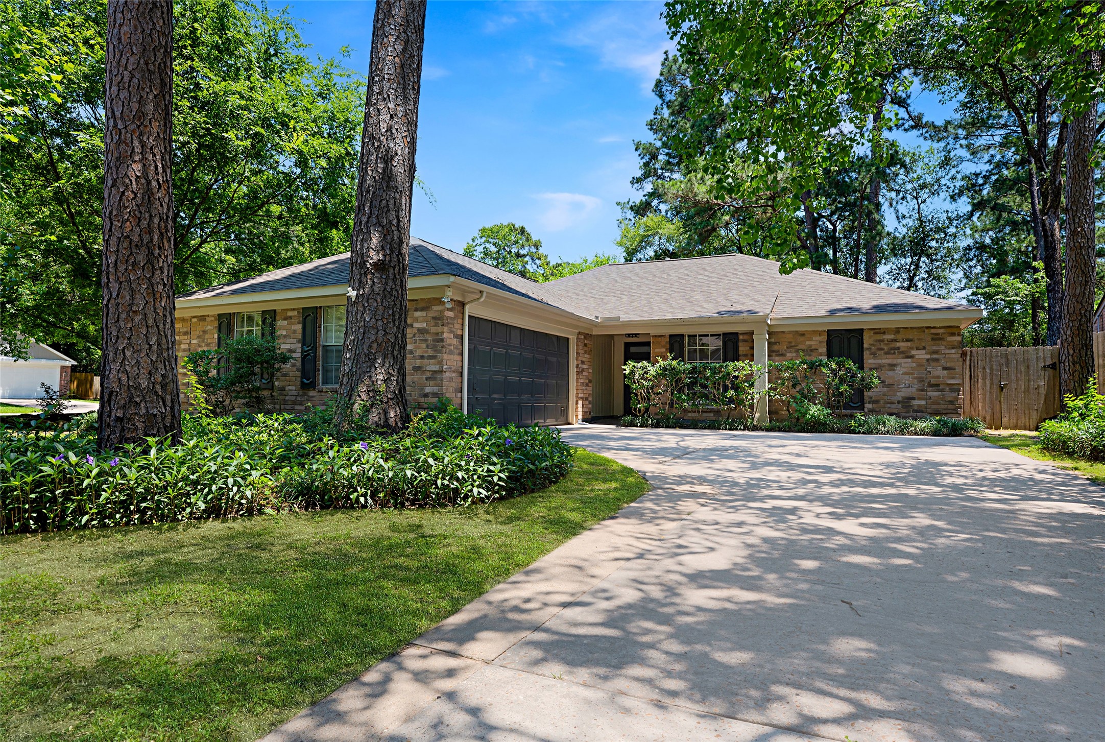 3 Still Corner Place Spring, TX 77381 - Photo 2 of 42 a front view of a house with a yard
