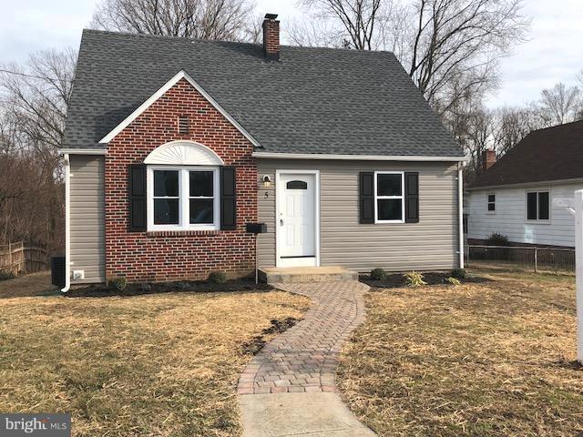 5 Patapsco Road Linthicum, MD 21090 - Photo 1 of 20 a front view of a house with a yard