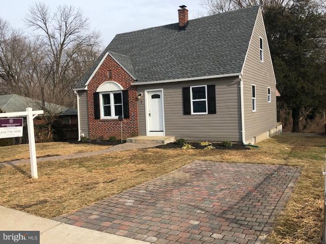 5 Patapsco Road Linthicum, MD 21090 - Photo 2 of 20 a front view of a house with a yard