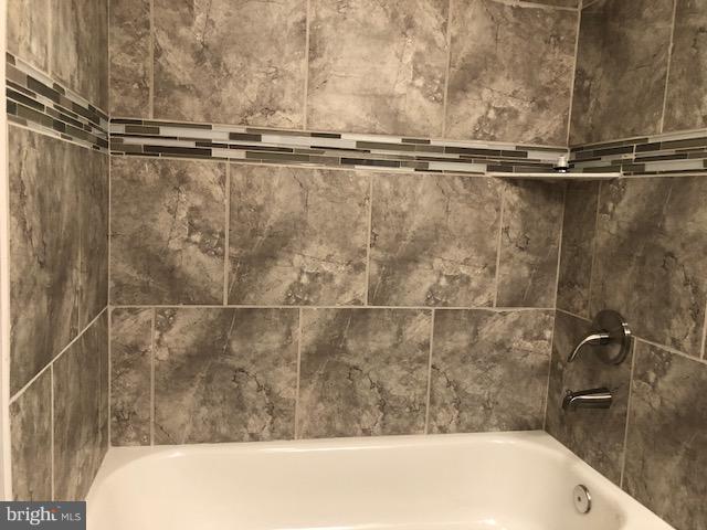 5 Patapsco Road Linthicum, MD 21090 - Photo 13 of 20 a bathroom with a bath tub