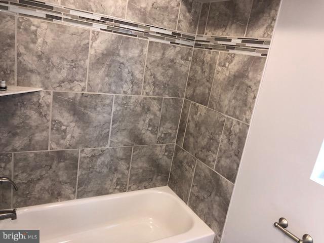 5 Patapsco Road Linthicum, MD 21090 - Photo 10 of 20 a bathroom with a bathtub