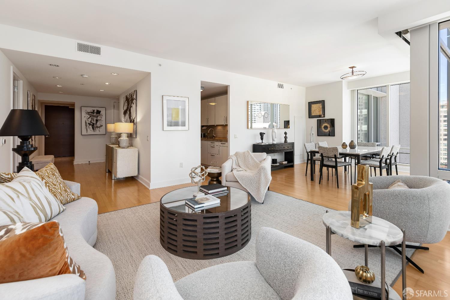 188 Minna, Unit 24A San Francisco, CA 94105 - Photo 12 of 43 a living room with furniture and wooden floor