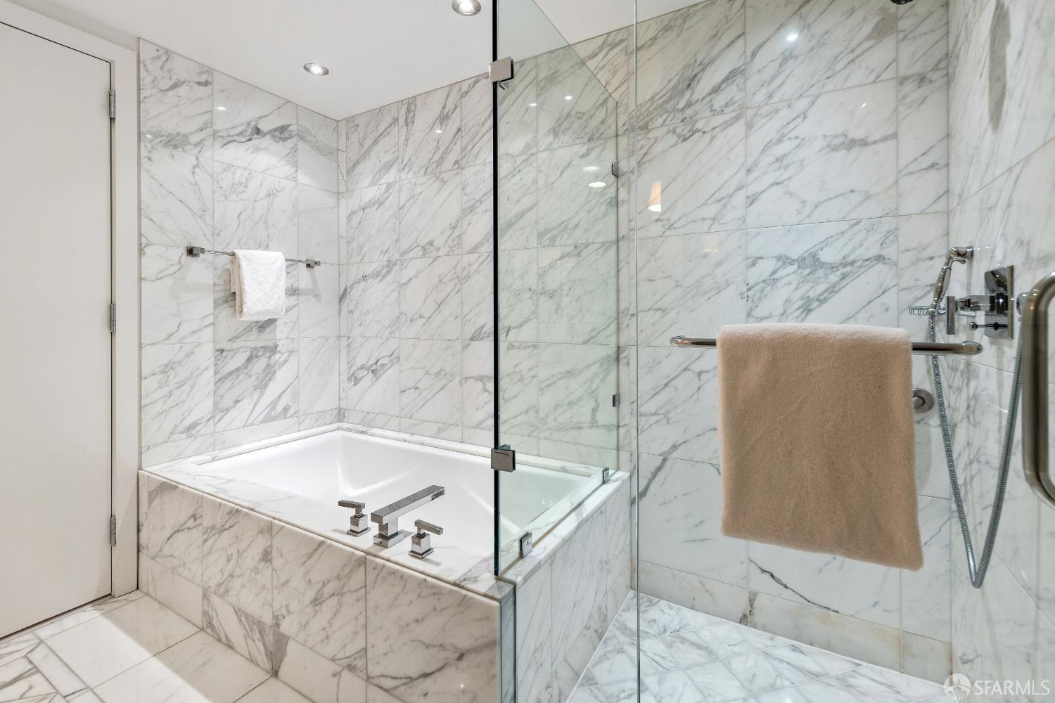 188 Minna, Unit 24A San Francisco, CA 94105 - Photo 19 of 43 a bathroom with a bathtub and a shower