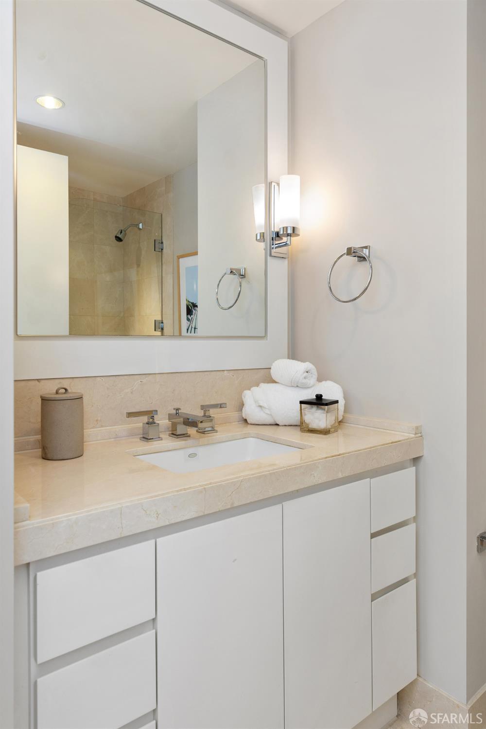 188 Minna, Unit 24A San Francisco, CA 94105 - Photo 26 of 43 a bathroom with a sink and a mirror