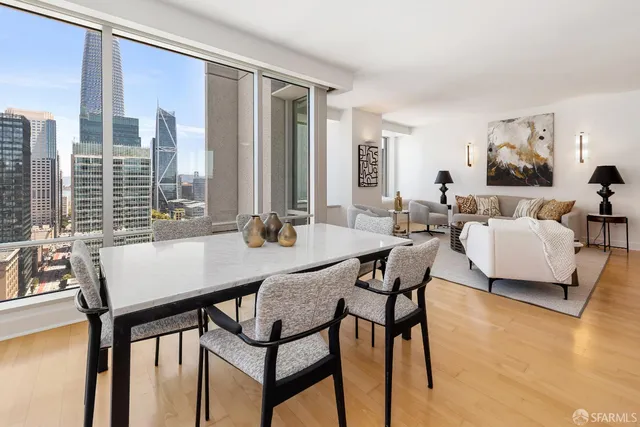 a view of a dining room with furniture window and outside view