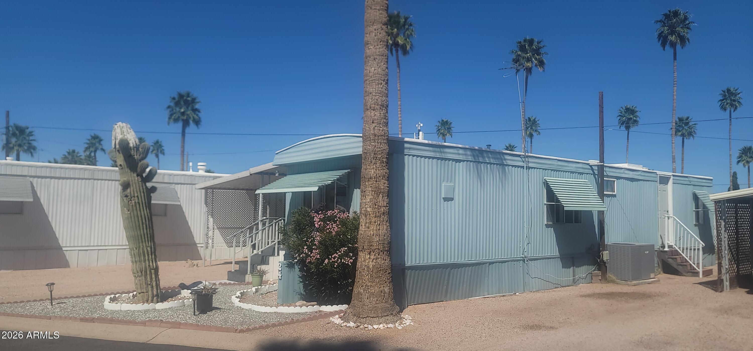 800 West Apache Trail, Unit 24 Apache Junction, AZ 85120 - Photo 3 of 11 a view of a house with a porch