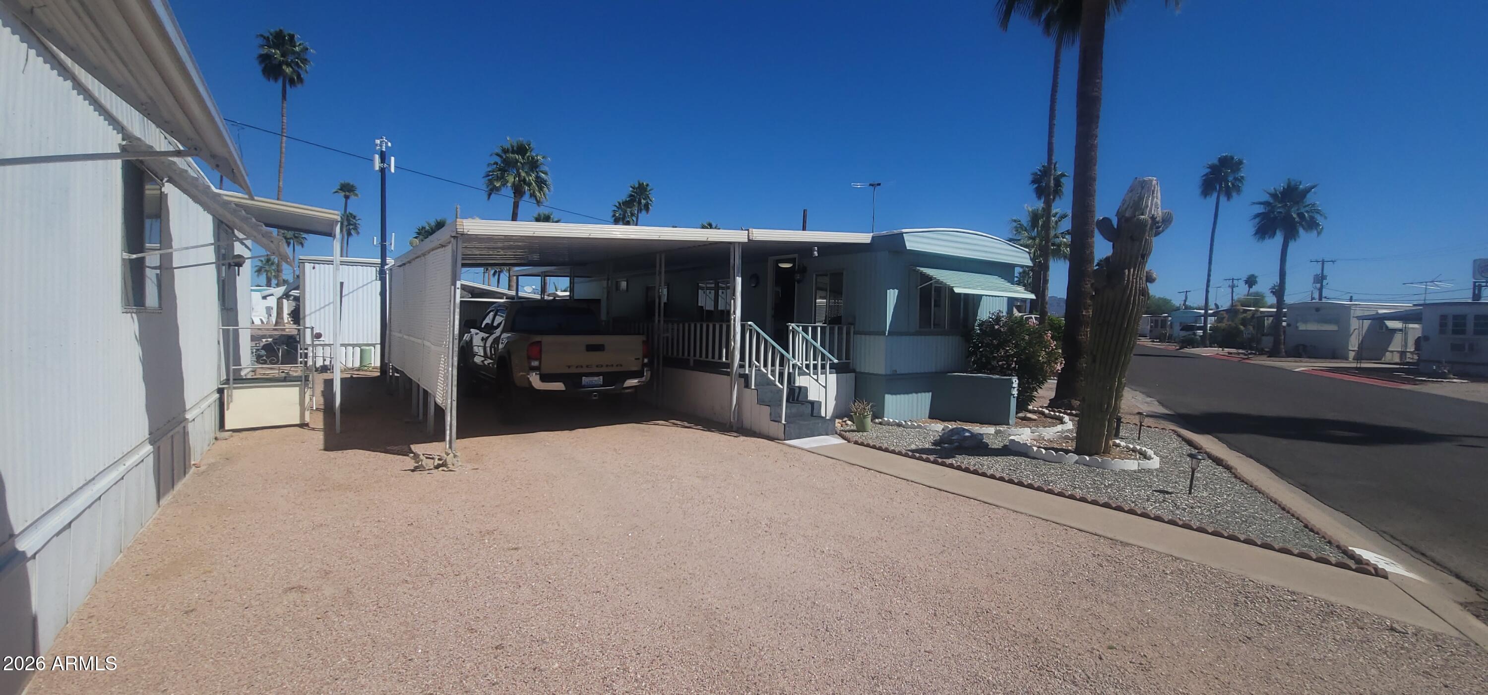 800 West Apache Trail, Unit 24 Apache Junction, AZ 85120 - Photo 10 of 11 a view of a house with a patio
