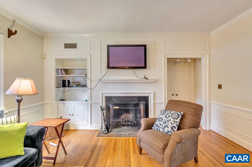 316 Alderman Road Charlottesville, VA 22903 - Photo 4 of 12 a living room with furniture and a fireplace