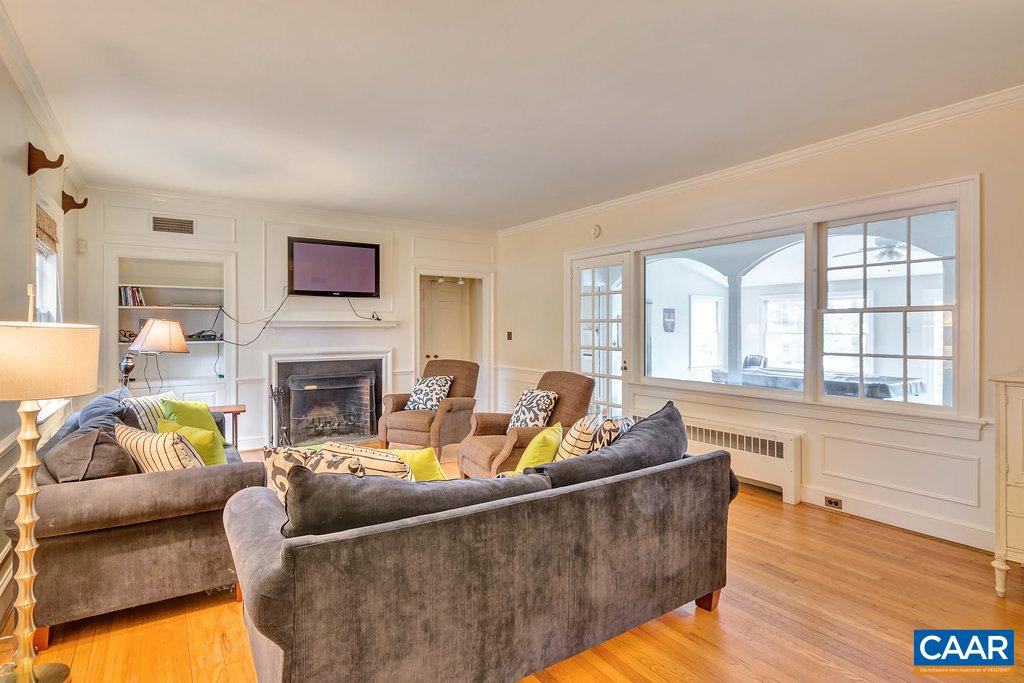316 Alderman Road Charlottesville, VA 22903 - Photo 5 of 12 a living room with furniture and a fireplace