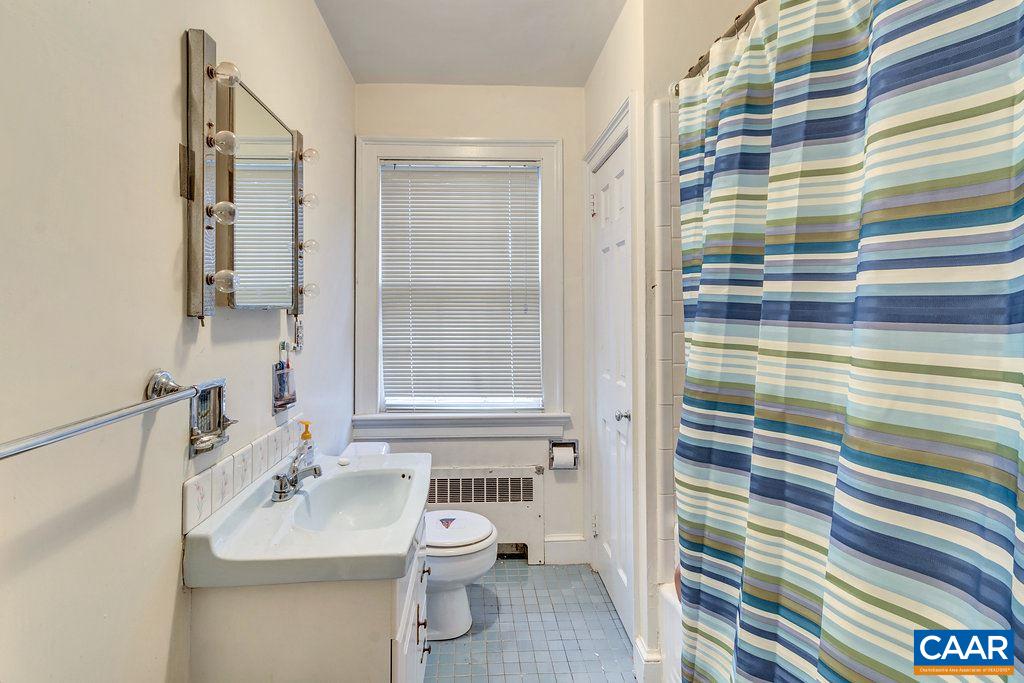 316 Alderman Road Charlottesville, VA 22903 - Photo 10 of 12 a bathroom with a sink toilet and shower