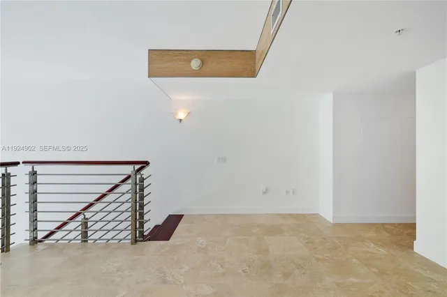 a view of entryway with stairs