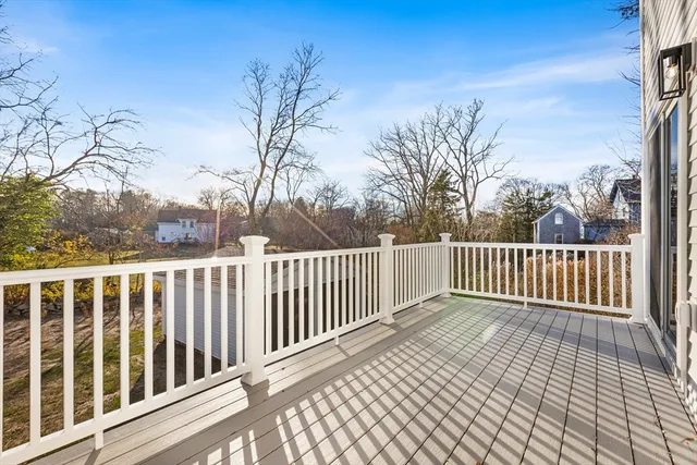 a view of yard with swimming pool and trees