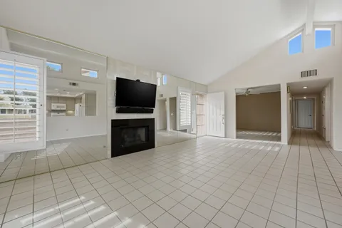 a view of a livingroom with a flat screen tv