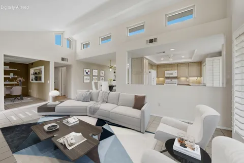 a view of an empty room with windows