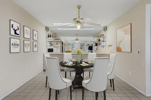 a kitchen with a refrigerator sink and stove