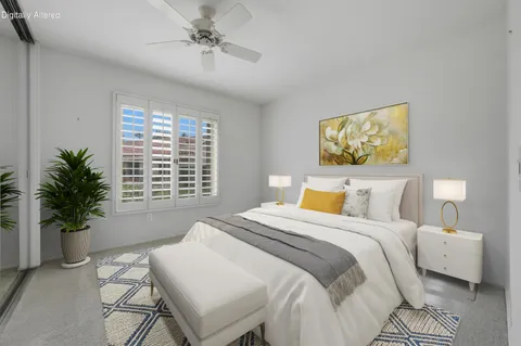a view of storage and utility room with washer and dryer