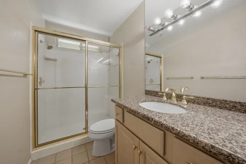 a view of a swimming pool and a back yard