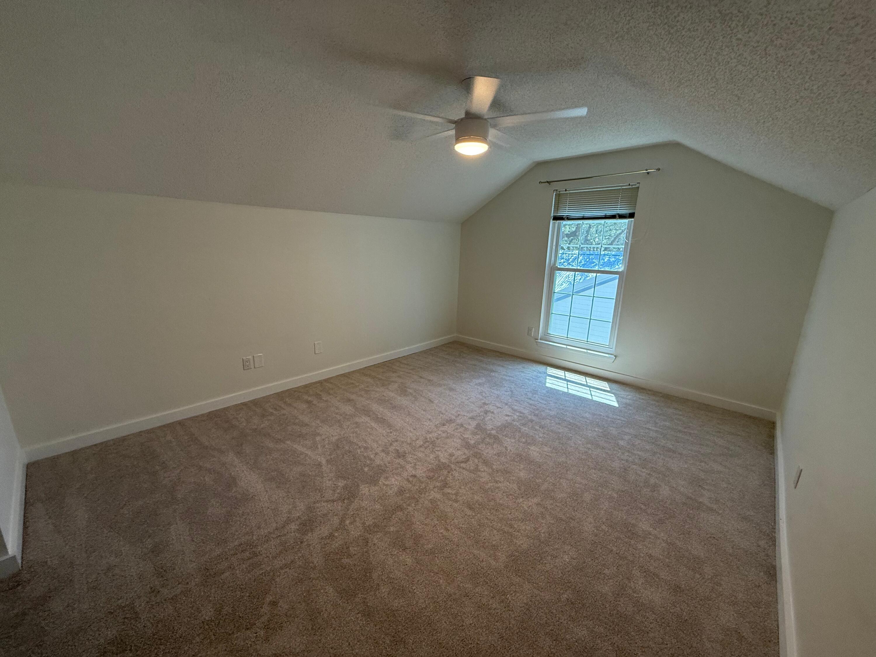 910 Elizabeth Lane Shalimar, FL 32579 - Photo 5 of 16 an empty room with a empty space and windows