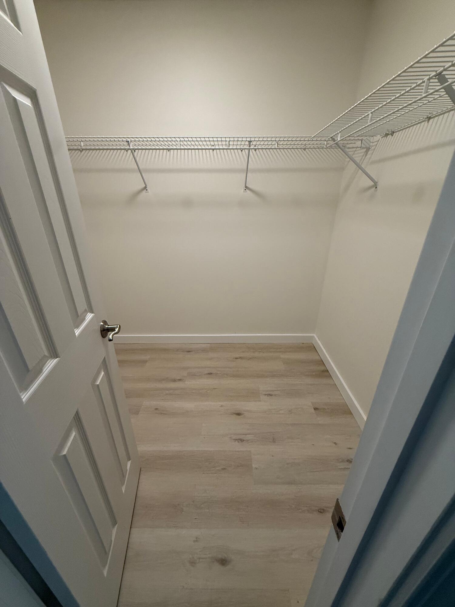 910 Elizabeth Lane Shalimar, FL 32579 - Photo 9 of 16 a view of a room with racks on the wall