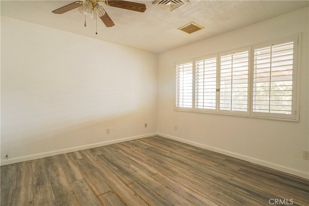 56320 Tamarisk Court Yucca Valley, CA 92284 - Photo 6 of 46 an empty room with a window