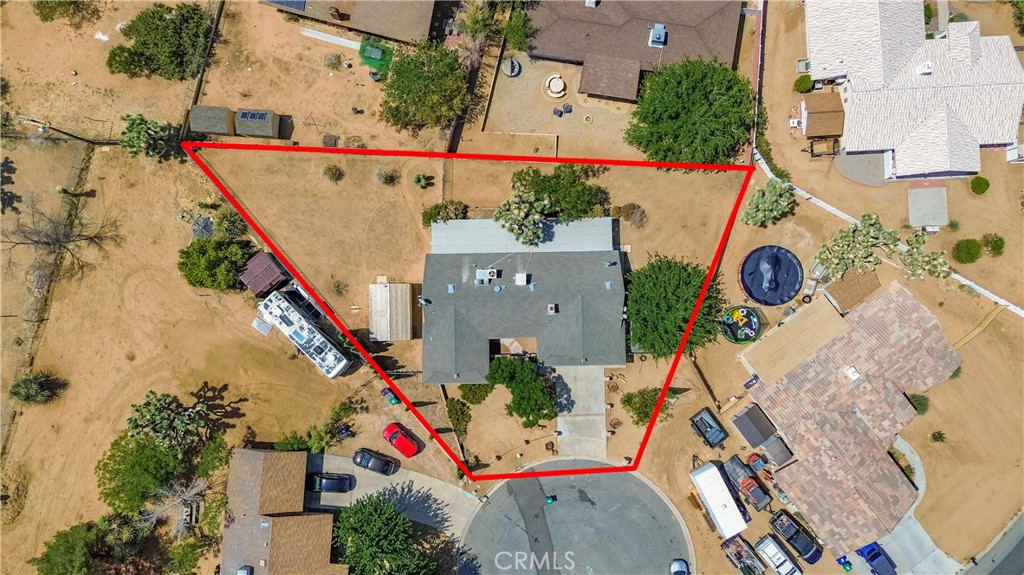 56320 Tamarisk Court Yucca Valley, CA 92284 - Photo 9 of 46 an aerial view of a house with a swimming pool