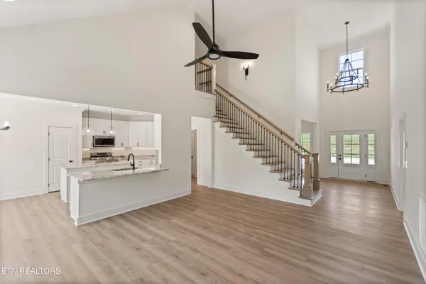 a view of a kitchen with a sink cabinets and window
