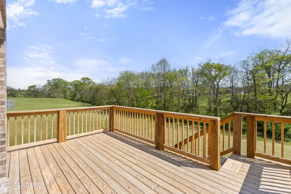 a view of a lake with a yard