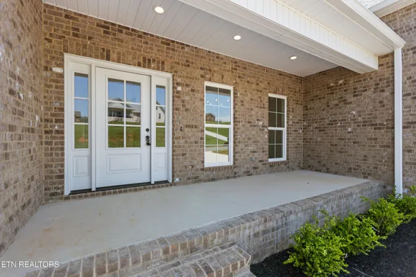 a view of a house with a street